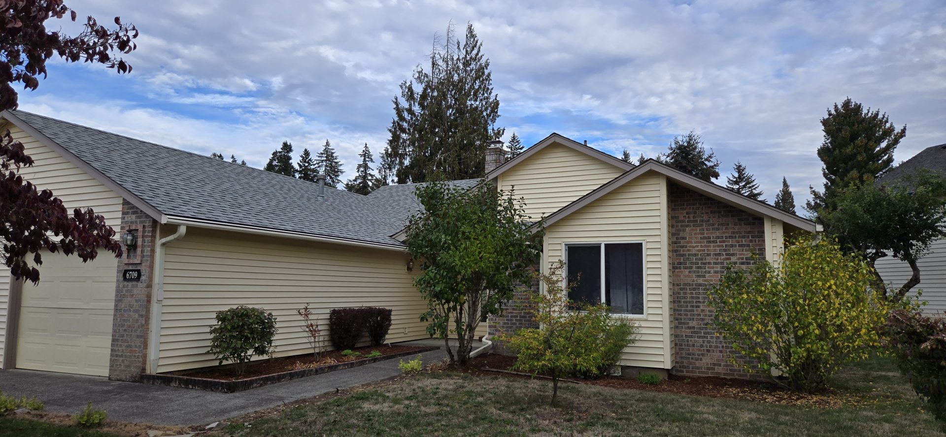 House exterior with grey sliding