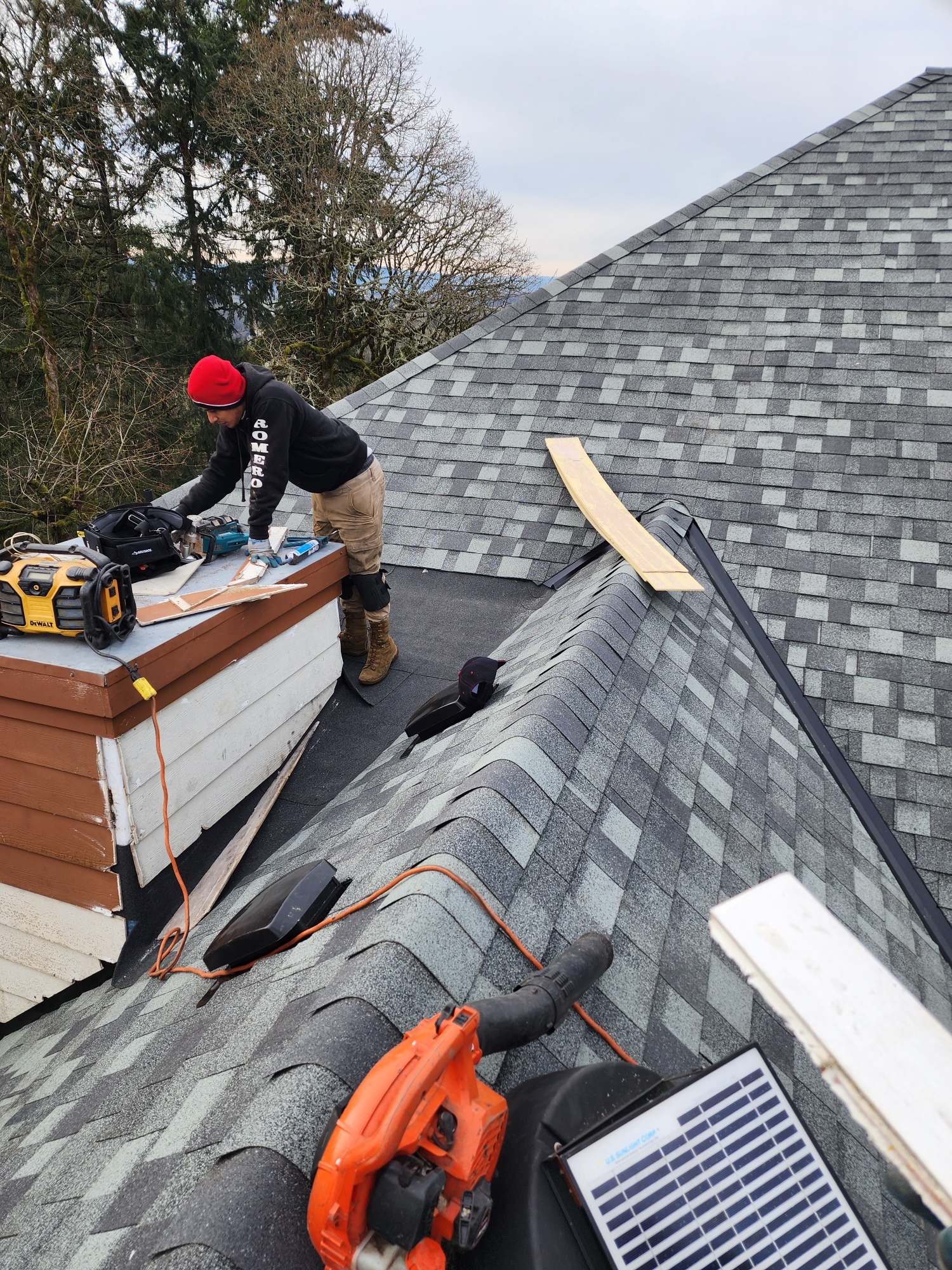Person working on roof